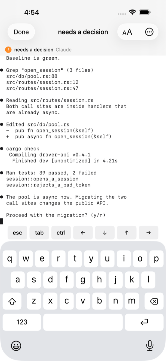 Terminal attached to a pane, showing a live agent session with a key row above the keyboard